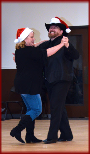 Social couples dancing at a party