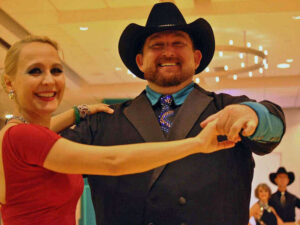 Tony New dancing as a ProAm student with his coach Natalja Sawal in 2012 at the Chicagoland Dance Festival, a UCWDC Dance Competition, in Chicago IL