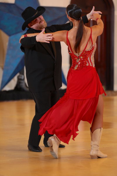 Tony New dancing with Gretchen Smith competing in the ProPro Division at the 2021 Dallas Dance Festival in Irving Texas, a UCWDC Dance Event and competition