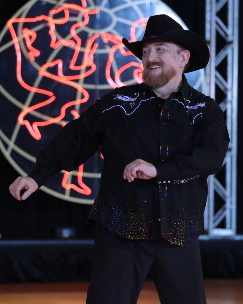 Tony New competing at the 2025 UCWDC World Championships of Country Dance