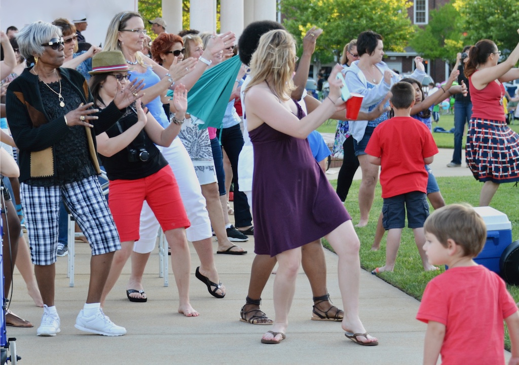 Line Dancers having fun line dancing in the Park